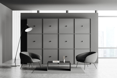 Dark office interior with two armchairs with coffee table. Large cupboard storage. Panoramic window on Singapore city view. 3D renderingの写真素材