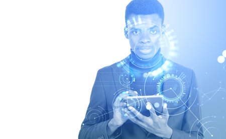African businessman using tablet silhouette, glowing network lines and circles hud hologram. Concept...
