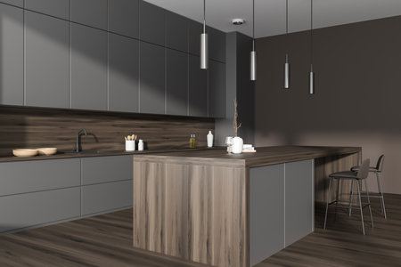 Corner view on dark kitchen room interior with gray wall, island with barstools, oak wooden floor, sink, gas cooker, oil, spoons, crockery, glass. Concept of minimalist design. 3d renderingの写真素材