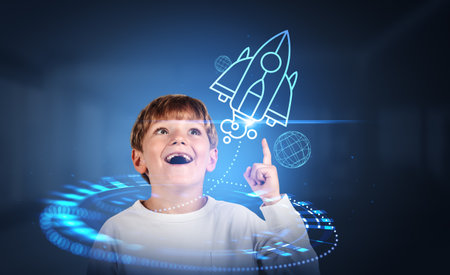 Happy school boy with opened mouth, finger pointing up at rocket hud hologram taking off. Future...