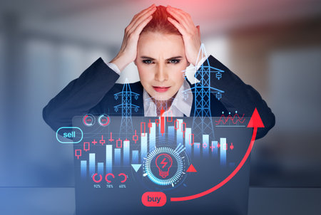 Stressed businesswoman holding head looking at laptop, radio towers and red candlesticks with rising...