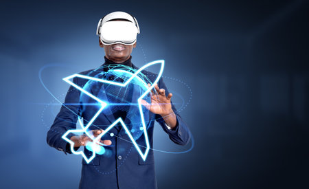 African businessman in vr glasses, hands touching airplane hud hologram. Virtual reality and...
