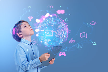 Child boy with tablet in hands, look up at earth sphere hologram with glowing icons. Virtual reality...
