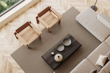Top view of wooden living room interior with sofa, two armchairs and coffee table with minimalist...