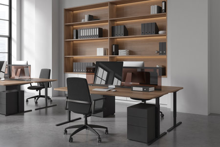 Dark business interior with coworking corner with pc computer on table, gray concrete floor. Shelf with documents and panoramic window on city view. 3D renderingの写真素材