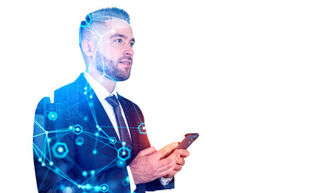 Dreaming handsome businessman wearing formal wear standing holding smartphone. City skyscraper and...