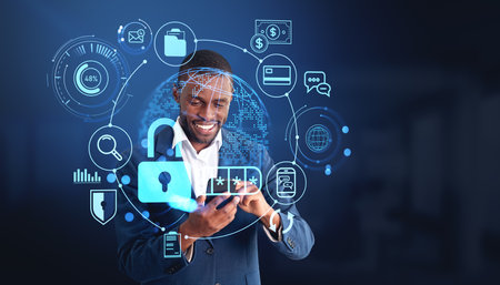 African American businessman in formal suit typing on smartphone with digital interface with padlock...