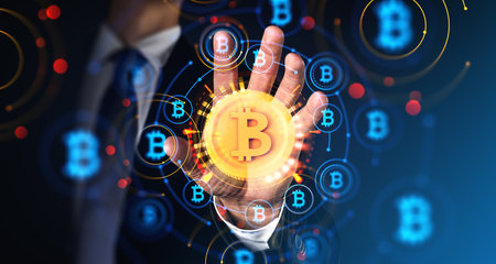 Unrecognizable businessman using blurry immersive cryptocurrency interface over dark blue background. Concept of blockchain and financeの写真素材