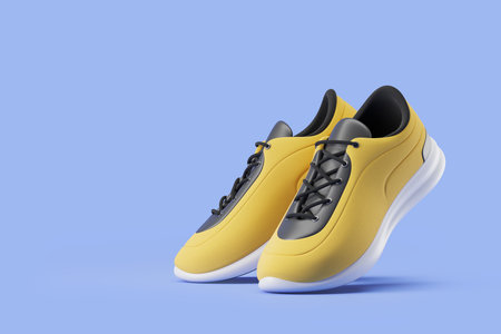 Bright and stylish yellow and black sport shoes with black shoelaces over light blue background. Concept of sport and active lifestyle. 3d rendering, mock upの写真素材