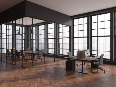 Dark business room interior with coworking and conference room behind glass doors, side view. Work corner with desk and pc computer, panoramic window. 3D renderingの写真素材