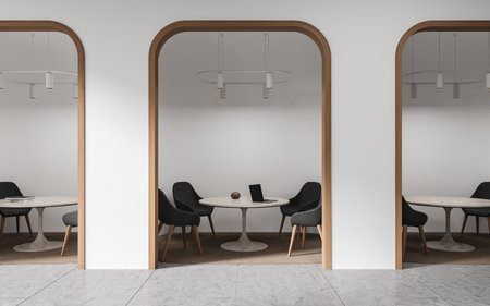 Stylish business office interior with table and laptop, chairs and meeting area. Work zone, customer service and waiting space in bank, arch wall and concrete floor. 3D renderingの写真素材