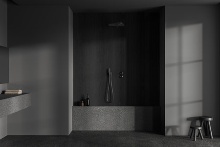 Interior of stylish bathroom with gray and dark wooden walls, stone floor and comfortable rain shower. 3d renderingの写真素材