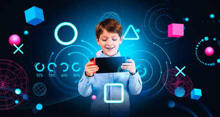 Smiling little boy using handheld console in metaverse over dark blue background. Concept of gaming...