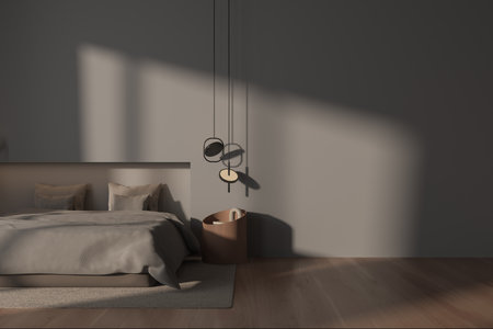 Interior of stylish master bedroom with gray walls, dark wooden floor, comfortable king size bed...