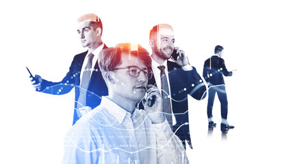 Four businessmen working together, texting and calling on the phone, silhouettes on white background. Double exposure with forex diagrams and financial analysis. Concept of conference and tradingの写真素材