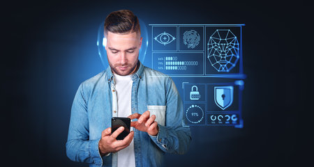 Businessman finger touch smartphone, digital biometric scanning and data analysis. Face detection...