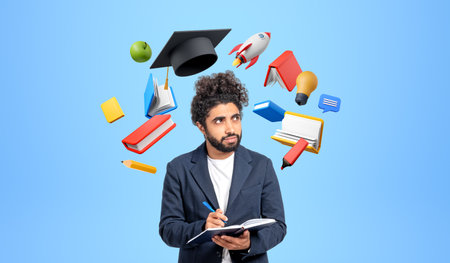 Pensive young Middle Eastern man college student standing with notebook and pen over blue background...