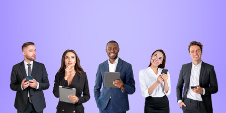 Five business people in row working together, smiling portraits on copy space purple background background. Using smartphone and tablet for online network. Concept of teamwork and conferenceの写真素材