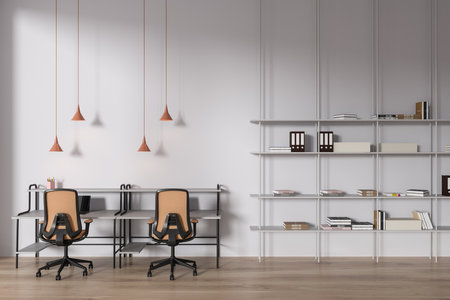White business classroom interior with desk and armchairs, minimalist shelf with books and folders on hardwood floor. Stylish educational space with computer and furniture. 3D renderingの写真素材