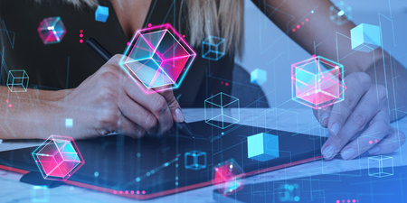 Woman drawing on a graphic tablet, creating NFT items. Glowing data blocks, technology and digital matrix lines. entertainment in cyberspace. Concept of digital art and virtual realityの写真素材