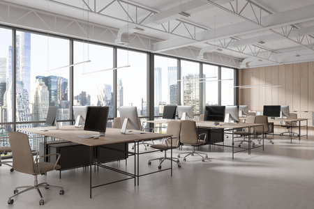 Open space business loft interior with office chairs in row, side view pc computers on wooden desk. Corporate coworking corner and panoramic window on New York skyscrapers. 3D renderingの写真素材