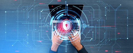 Top view of man hands typing on laptop keyboard, double exposure cybersecurity hud hologram with...