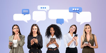 Portraits of five diverse businesswomen standing in row and using smartphones with speech bubbles...