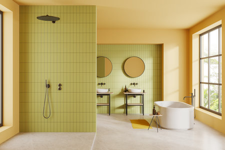 Yellow and green tile hotel bathroom interior with bathtub and shower, partition and double sink with accessories. Panoramic window on tropics. 3D renderingの写真素材