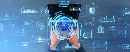 Top view man hands typing in laptop, glowing dashboard double exposure with forex analysis and graph...
