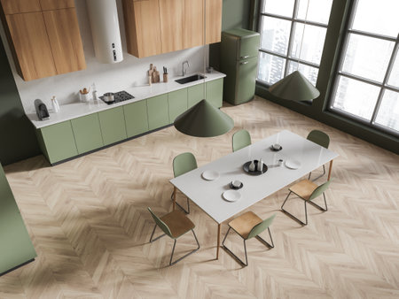 Top view of home kitchen interior with eating table and chairs, hardwood floor. Green and wooden cooking corner with cabinet and refrigerator. Panoramic window on skyscrapers. 3D renderingの写真素材