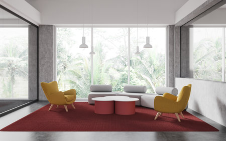 Elegant office lobby interior with sofa and yellow armchairs, red carpet on concrete floor. Glass...