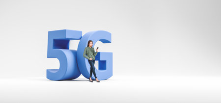 Happy woman using smartphone, big 5G symbol on copy space empty white background. Concept of network, future internet connection, innovation and digital technologyの写真素材