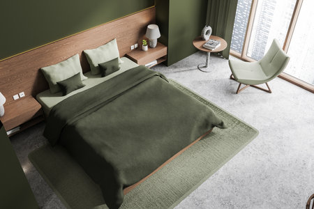 Top view of home bedroom interior with bed and chaise longue, carpet on gray concrete floor. Elegant chill corner with panoramic window on skyscrapers. 3D renderingの写真素材