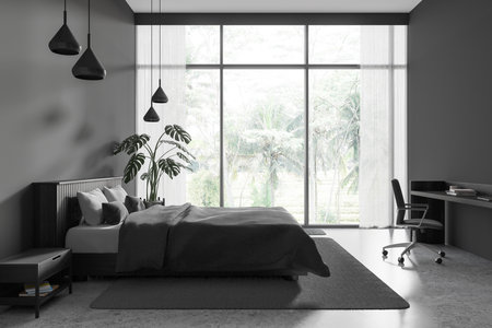 Dark hotel bedroom interior bed and workplace, armchair and decoration, carpet on gray concrete floor. Cozy sleep room with workplace and panoramic window on tropics. 3D renderingの写真素材