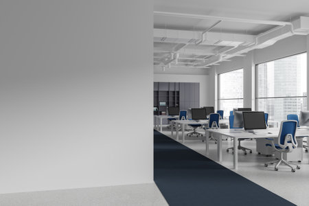 Corner view industrial office interior with pc computers on desk and shelf. Stylish workplace with...