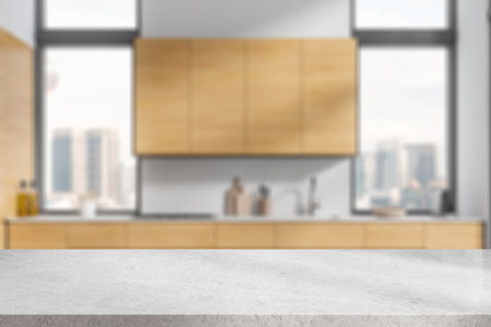 Stone table on blurred background of minimalist home kitchen interior, sink with stove and kitchenware. Panoramic window on skyscrapers. Mock up copy space for product display. 3D renderingの写真素材
