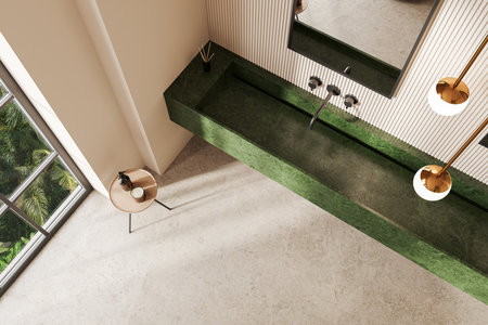 Top view of luxury beige hotel bathroom interior with green sink, panoramic window on tropics. Stool with accessories on light concrete floor. 3D renderingの写真素材