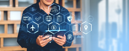 Businessman with tablet in hands, double exposure hologram with logistics icons. Concept of global...