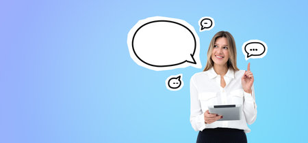 Happy beautiful woman with tablet and finger point up, speech or thought bubbles on blue background....