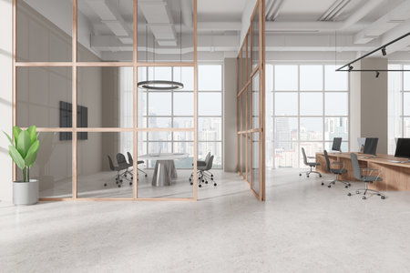 Stylish business interior with glass meeting and coworking room, pc computers on desk with armchairs on concrete floor. Panoramic window on Singapore skyscrapers. 3D renderingの写真素材