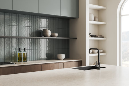 Corner view of stylish home kitchen interior with bar counter, sink and stove, shelf with dishes and...