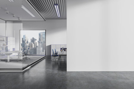Modern business interior with coworking space and armchairs, pc computers on desks in row. Glass conference room. Panoramic window on skyscrapers. Mockup empty wall partition. 3D renderingの写真素材