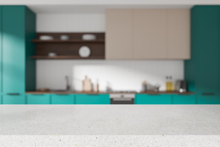 Empty stone table on blurred background of eclectic home kitchen interior, colored design with cabinet and kitchenware. Mock up copy space for product display. 3D renderingの写真素材