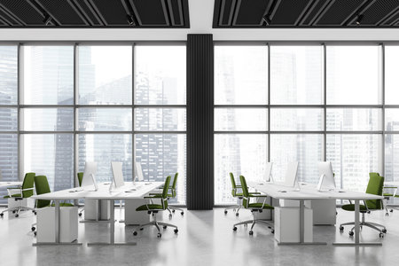 Open space office interior with pc computers on desks in row, concrete floor. Stylish workplace with minimalist furniture and panoramic window on Singapore skyscrapers. 3D renderingの写真素材