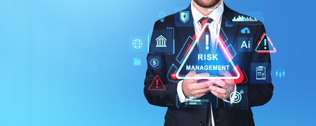 Businessman hands using phone, virtual screen with risk management icon and glowing diverse banking or marketing symbols. Copy space. Concept of business safety and researchの写真素材