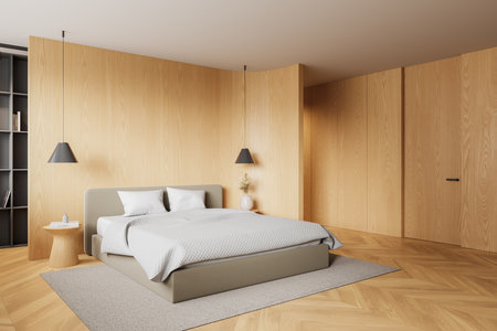 Corner view of wooden hotel bedroom interior with bed, nightstand and shelf with decoration. Sleep room with invisible door, carpet on hardwood floor. 3D renderingの写真素材