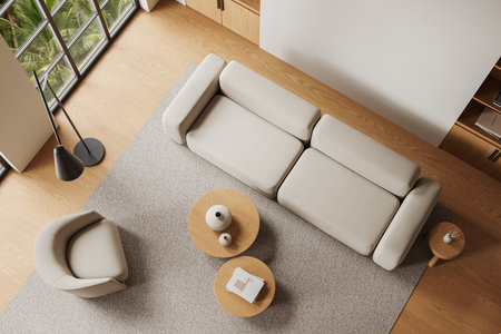 Top view of light home living room interior, modular sofa and armchair. Coffee table with decoration and shelf on hardwood floor. Panoramic window on tropics. 3D renderingの写真素材