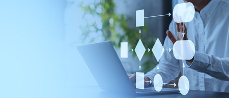 Businessman using laptop and finger touch empty workflow chart, copy space block diagram with...