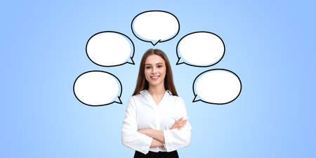 Successful businesswoman with hands crossed, copy space empty thought bubbles on blue background....