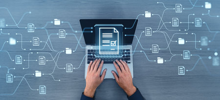 Top view of man hands working with laptop, double exposure with online documentation system and...